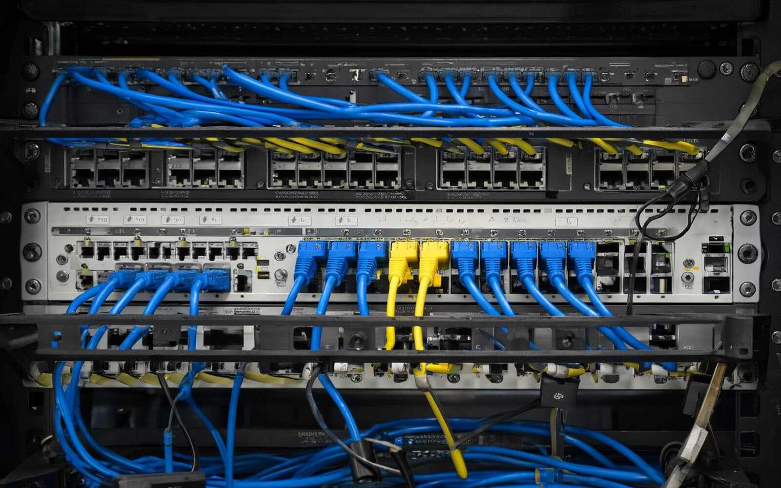 A server rack with patched network cabling